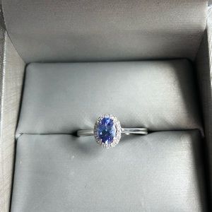Tanzanite white gold ring with halo diamonds